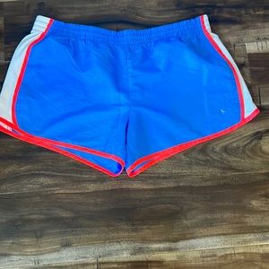 Danskin Women’s size Xl athletic shorts. Light blue, white and coral. Like new